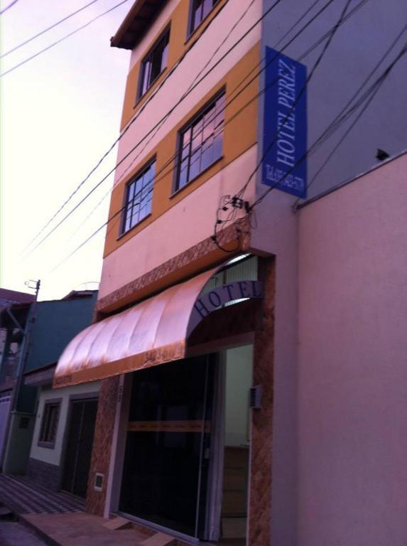 Hotel Perez Pouso Alegre Bagian luar foto