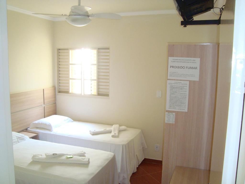 Hotel Perez Pouso Alegre Ruang foto